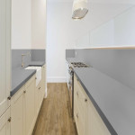 Pro-Tek™ Editions Classic Battersea Oak Luxury Click Vinyl Flooring Installed in a Modern Kitchen