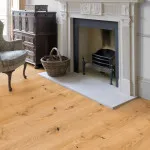 Kingswood Natural Oak in Rustic Grade Brush & UV Oiled Engineered Wood Flooring Installed in Living Room with a Fireplace
