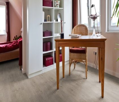 Pro-Tek™ Editions Classic Regents Grey Luxury Click Vinyl Flooring Installed in a Compact Livingroom