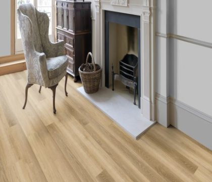 Pro-Tek™ Editions Classic Richmond Oak Luxury Click Vinyl Flooring Installed in a Livingroom with Fireplace