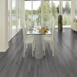 Pro-Tek™ Editions Classic Rutland Grey Luxury Click Vinyl Flooring Installed in a Modern Dining Room