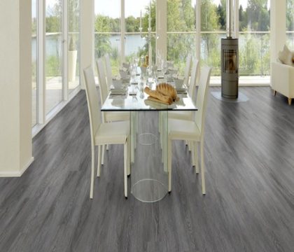 Pro-Tek™ Editions Classic Rutland Grey Luxury Click Vinyl Flooring Installed in a Modern Dining Room