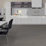 Pro-Tek™ Editions Tiles Smoke Travertine Luxury Vinyl Click Flooring Installed in a Dining Room