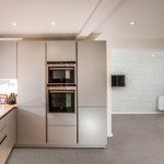 Pro-Tek™ Editions Tiles Grey Travertine Luxury Vinyl Click Flooring Installed in a Modern Kitchen