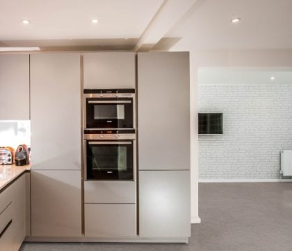 Pro-Tek™ Editions Tiles Grey Travertine Luxury Vinyl Click Flooring Installed in a Modern Kitchen