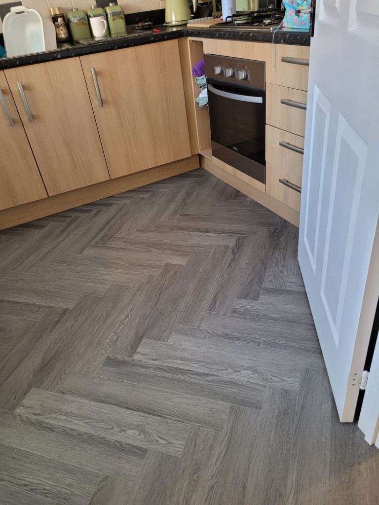 Pro-Tek™ Editions Herringbone Buckingham Grey Luxury Vinyl Click Flooring